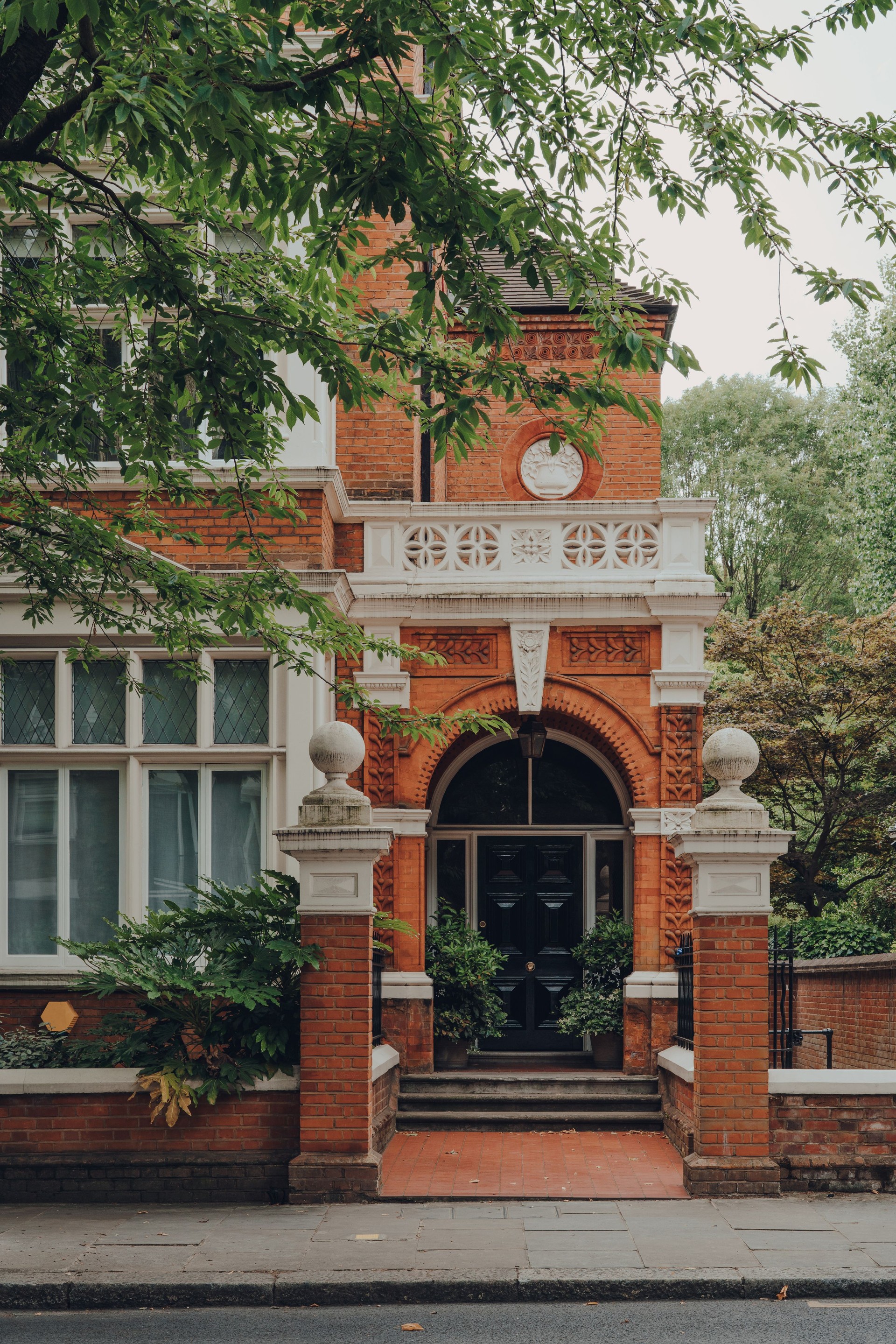 Victorian red brick house in Kensington, London, UK.
